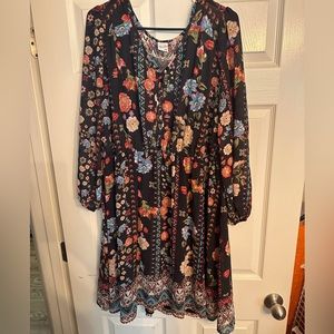 American Rag 1x mid length dress. Black and floral.